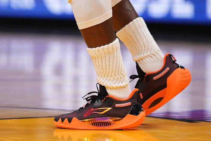 View of Jimmy Butler's black and orange shoes.